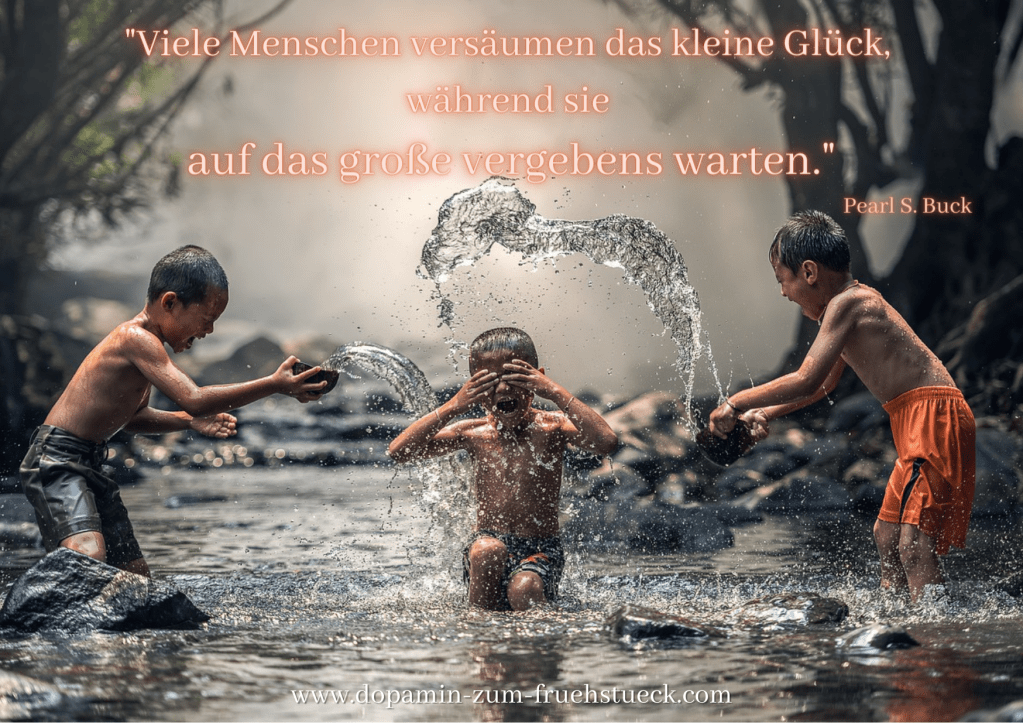 drei Kinder, die sich in einem Fluss mit Wasser bespritzen und dabei lachen