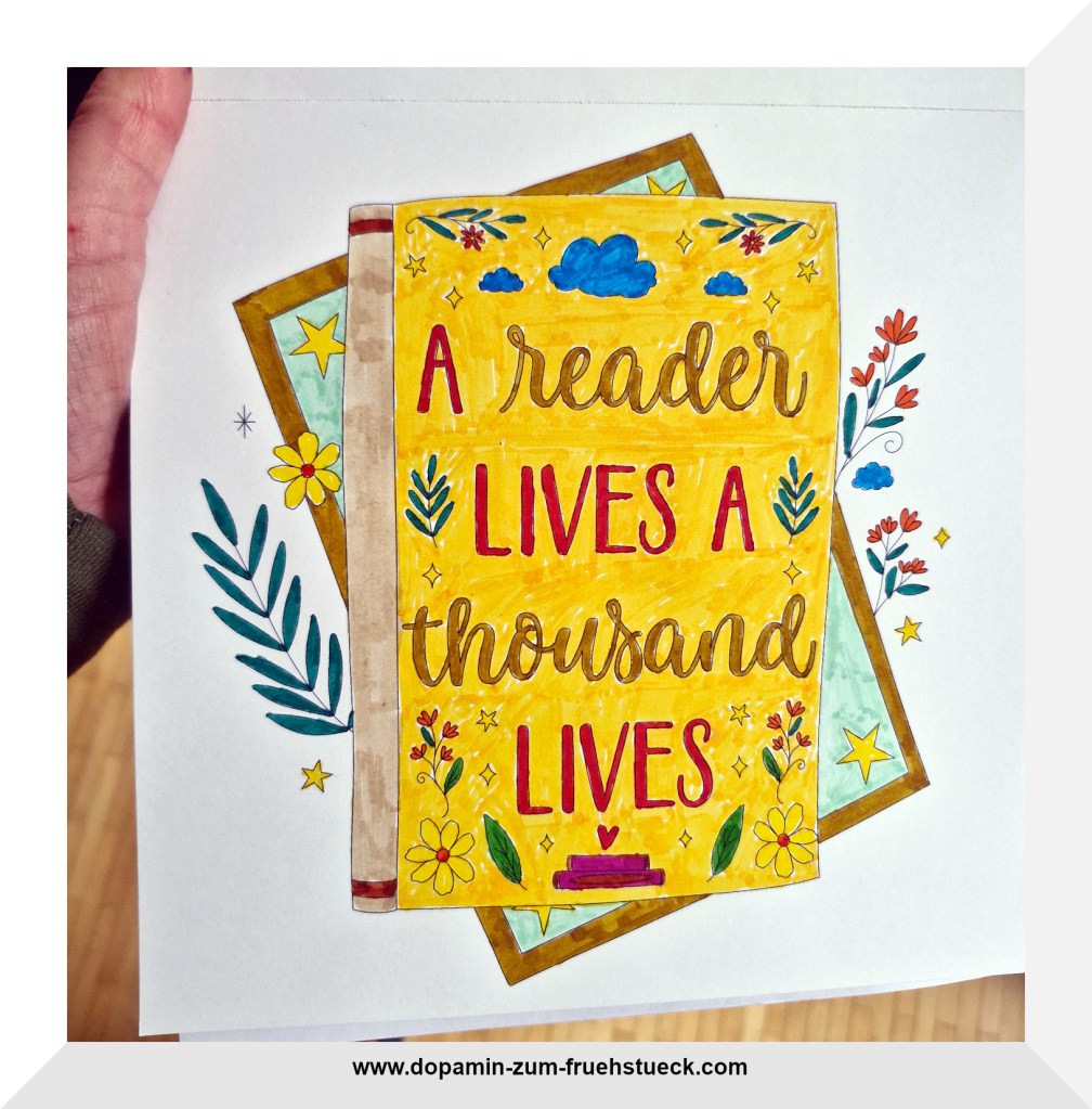 "A reader lives a thousend lives" Text in bunten Farben.